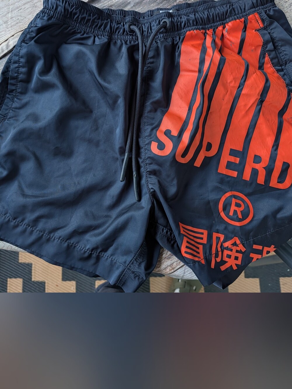 Superdry Men's Navy Blue Swim Shorts with Orange Graphic